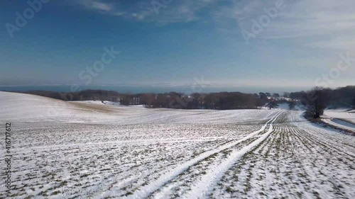 aerial snowy landscape footage from mols bjerge and djursland located in central denmark