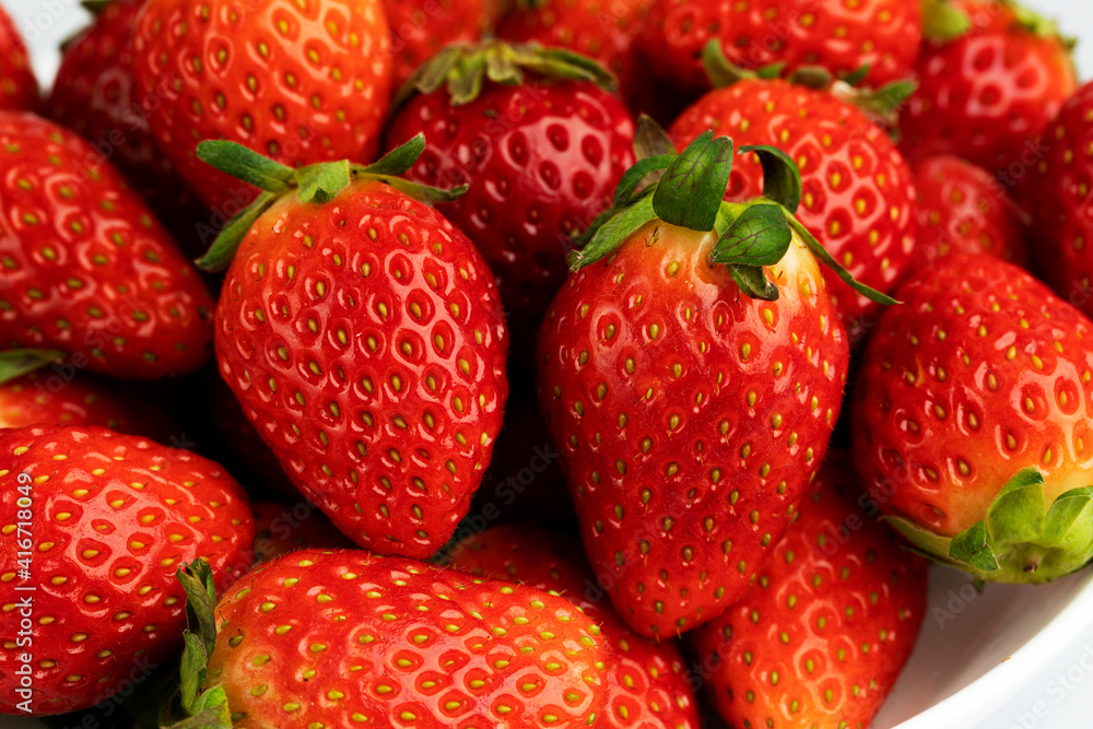 Plakat Strawberry in isolate background in macro shot.
