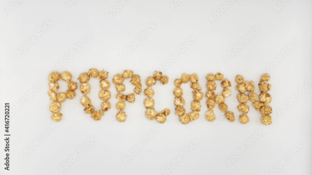 The popcorn label is drawn with popcorn. Stop-motion frame-by-frame animation The popcorn label is drawn with popcorn. Stop-motion frame-by-frame animation