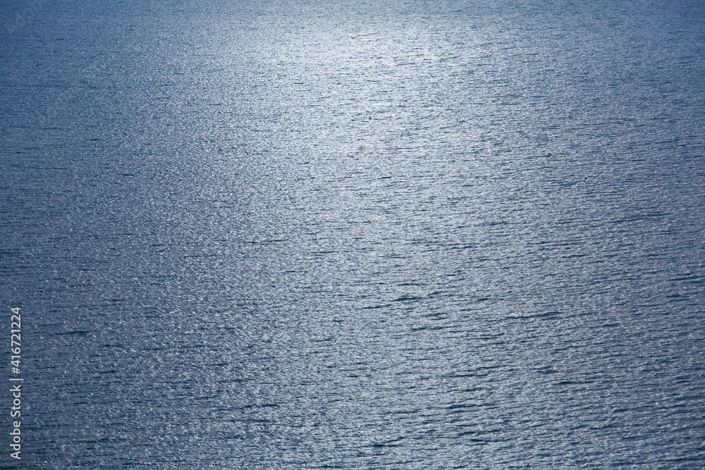 Blue tropical sea surface with waves and ripples Blue tropical sea surface with waves and ripples