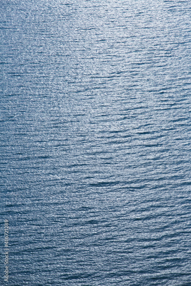 Blue tropical sea surface with waves and ripples Blue tropical sea surface with waves and ripples
