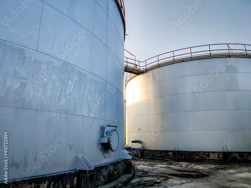 Fuel storage tank oil. Large white industrial for tank oil. Crude oil export factory industry And storage tank . industrial pipes 
