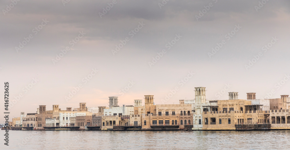 buildings of Old Dubai at sunrise