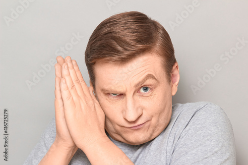 Fotografija Portrait of mature man conspiring and scheming