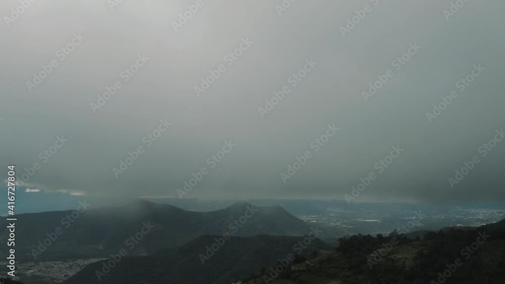 Drone aerial high over the mountains during cloudy misty day in Central america Drone aerial high over the mountains during cloudy misty day in Central america