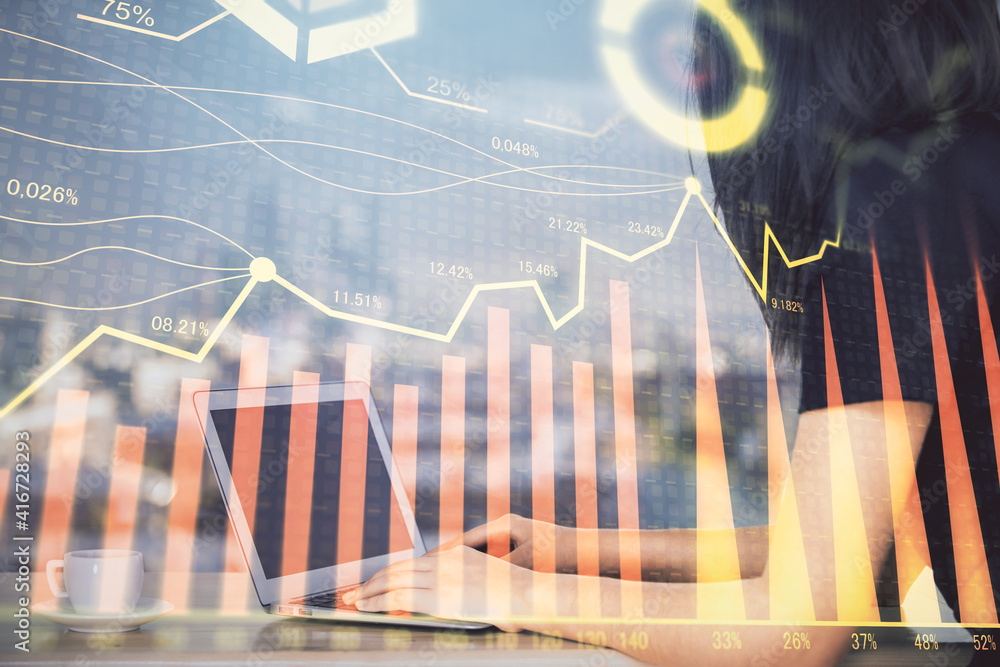 Double exposure of businesswoman hands typing on computer and forex chart hologram drawing. Financial analysis concept. Double exposure of businesswoman hands typing on computer and forex chart hologram drawing. Financial analysis concept.