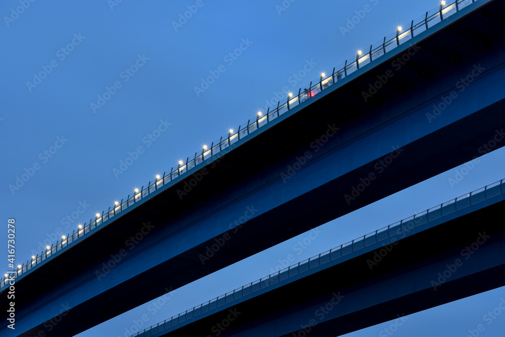 low angle view of bridge at blue hour