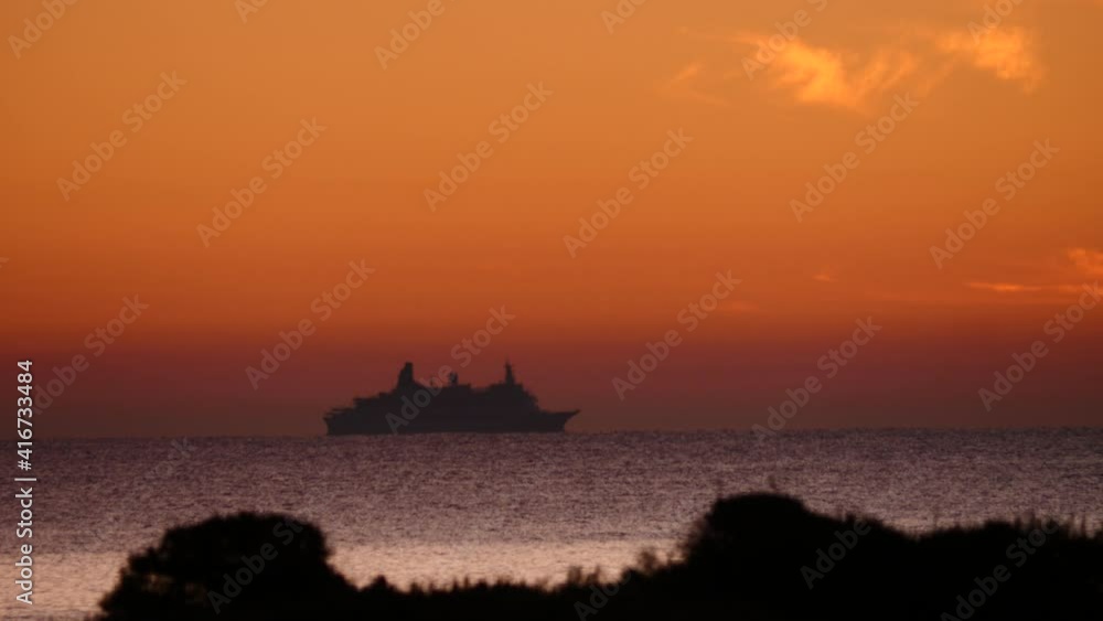 Seascape at morning with big cruise ship on horizon. Traveling holiday and tourism. Seascape at morning with big cruise ship on horizon. Traveling holiday and tourism.