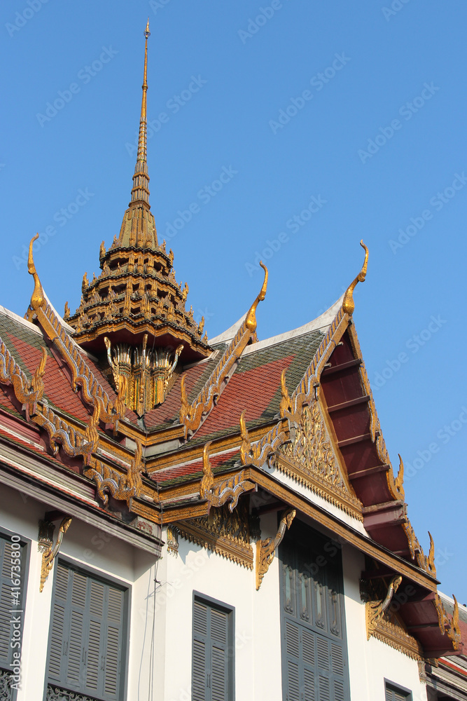 surrounding wall and buildings at the royal palace in bangkok in thailand