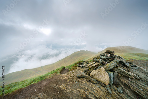 Obraz na płótnie The stone summit cairn of Meall nan Tarmachan in the Scottish Highlands, UK landscapes. w salonie