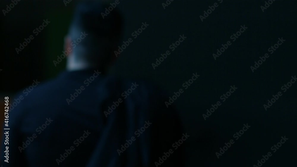 a brutal charismatic guy in a black suit a brutal charismatic guy in a black suit