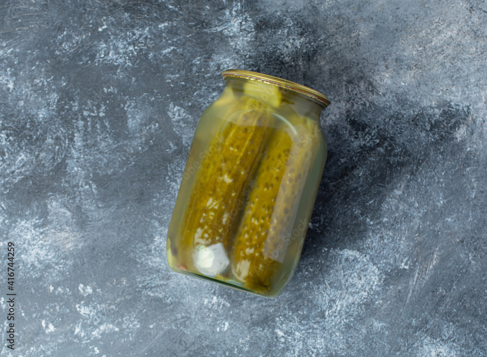 Top view of pickle jar on grey background Top view of pickle jar on grey background
