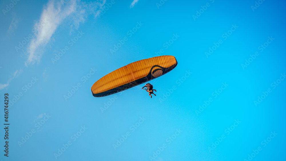 Naklejka premium Paragliding on a sunny day in India.