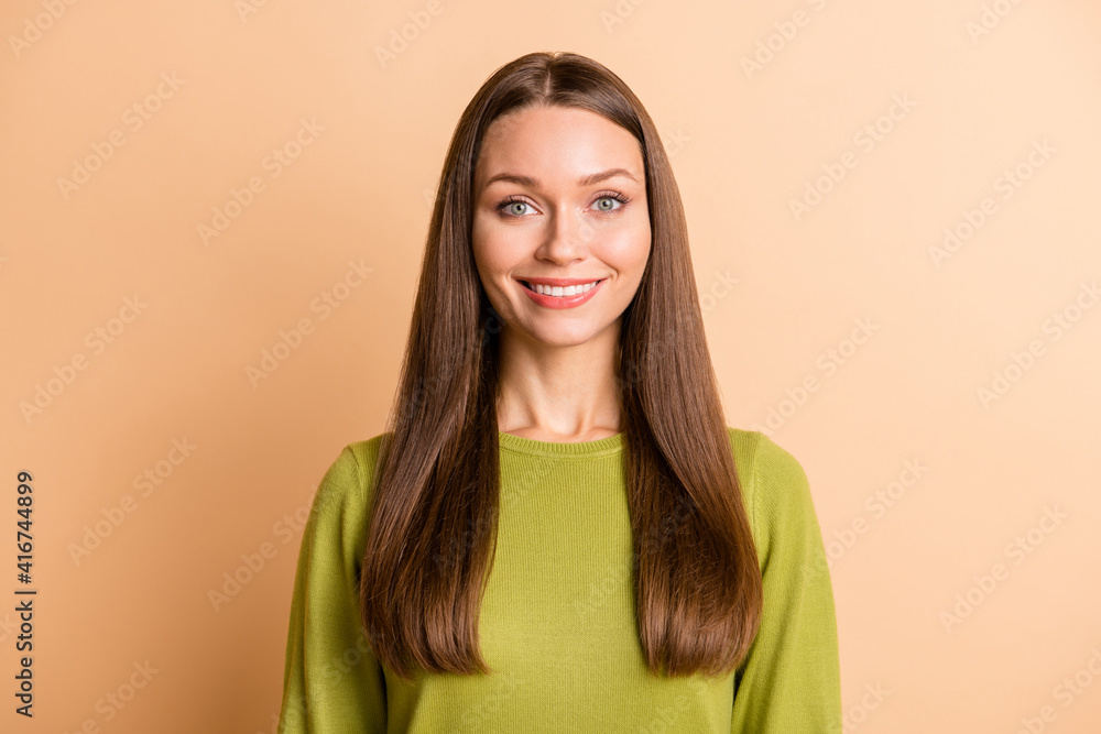 Portrait of attractive cheerful girl well-groomed look outfit isolated over beige pastel color background Portrait of attractive cheerful girl well-groomed look outfit isolated over beige pastel color background