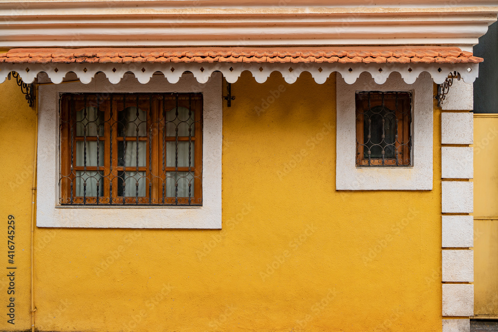Yellow colored beautiful wall in Fontainhas Goa Yellow colored beautiful wall in Fontainhas Goa