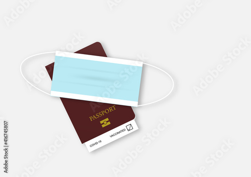 Vaccine passport and face mask on white background