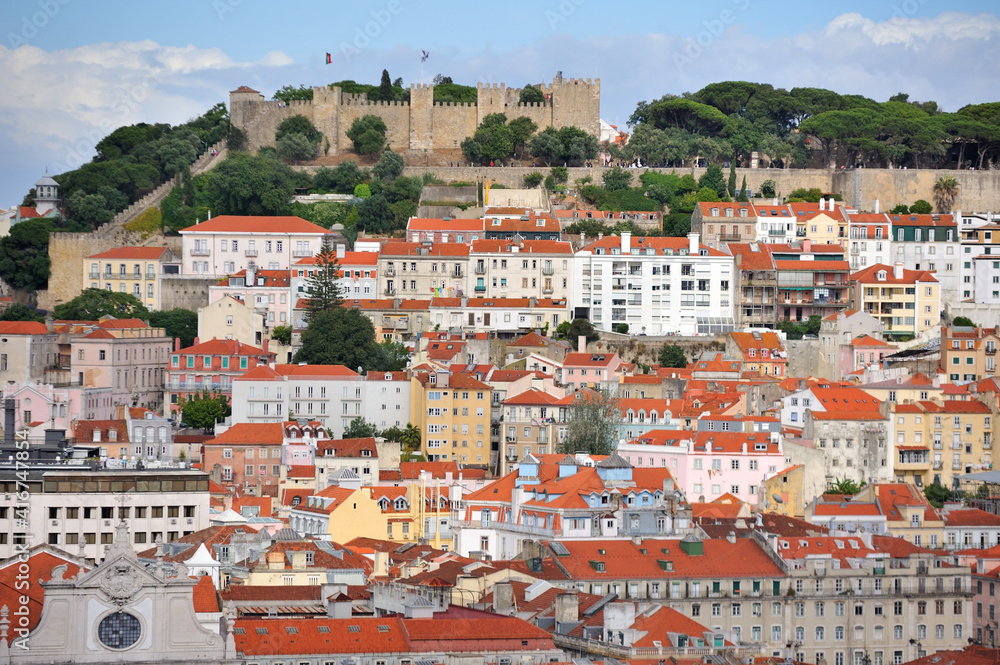 top view over the orange roofs of lisbon on a beautiful sunny day, Portugal