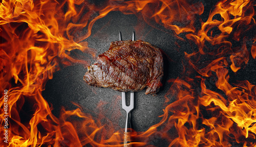 Tablou canvas grilled cowboy beef steak on a dark background