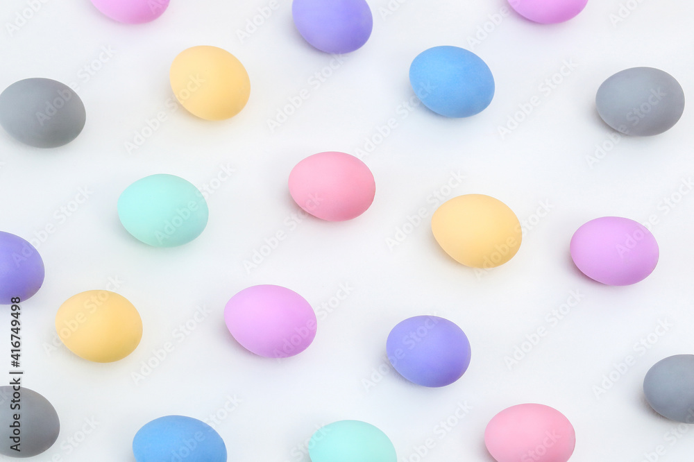 
Easter composition, colorful Easter eggs on a white surface