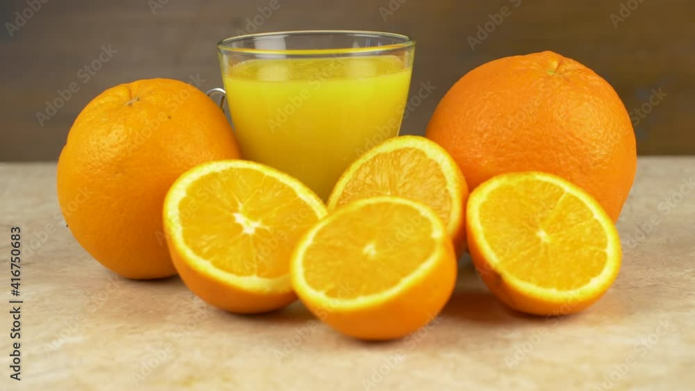 glass of fresh orange juice with fresh fruits on marble table glass of fresh orange juice with fresh fruits on marble table