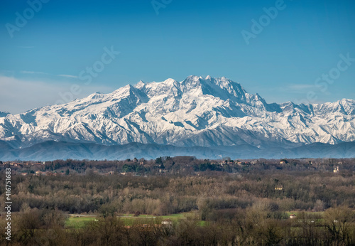 The snow-capped Monte Rosa chain on a sunny morning in winter..View of the Lombard Alps. photo