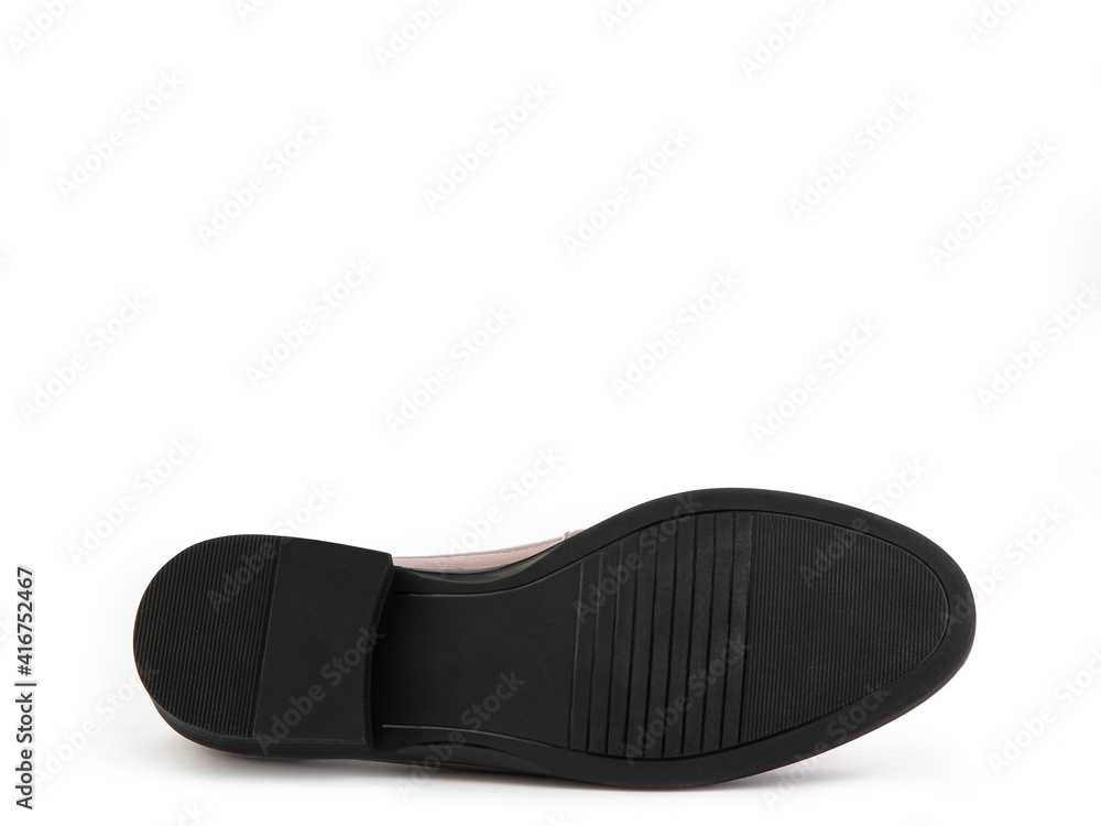 Stylish and elegant brown lacquered women's loafers. Trendy flat leather shoes with square toe, metal detail and black sole. Isolated close-up on white background. Shoe sole view. Fashion shoes. Stylish and elegant brown lacquered women's loafers. Trendy flat leather shoes with square toe, metal detail and black sole. Isolated close-up on white background. Shoe sole view. Fashion shoes.
