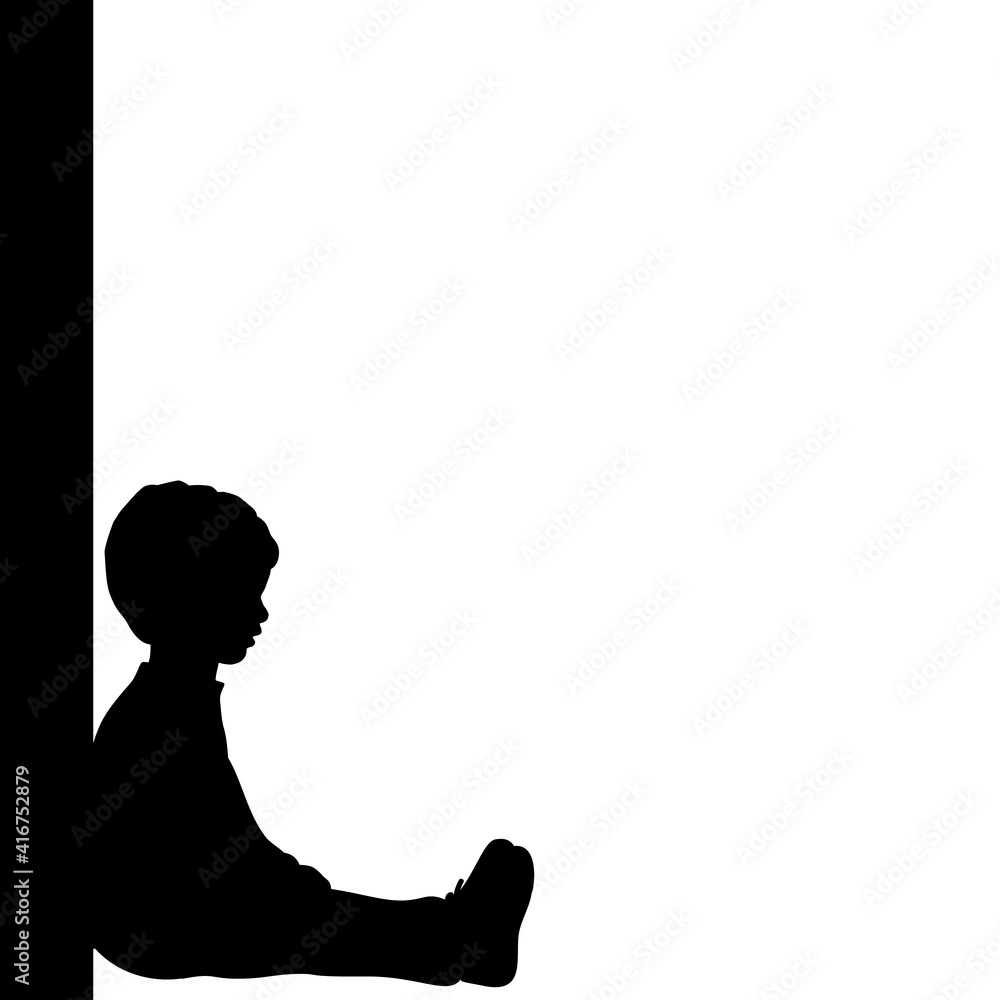 Silhouette little boy sitting by the wall Silhouette little boy sitting by the wall