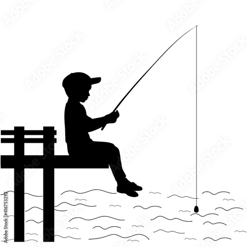 Silhouette little boy is fishing