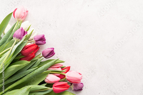 tulip bouquet on white concrete background