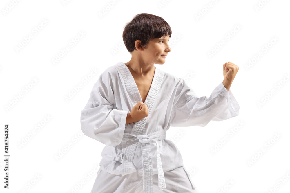 Child in kimono practicing martial arts Child in kimono practicing martial arts