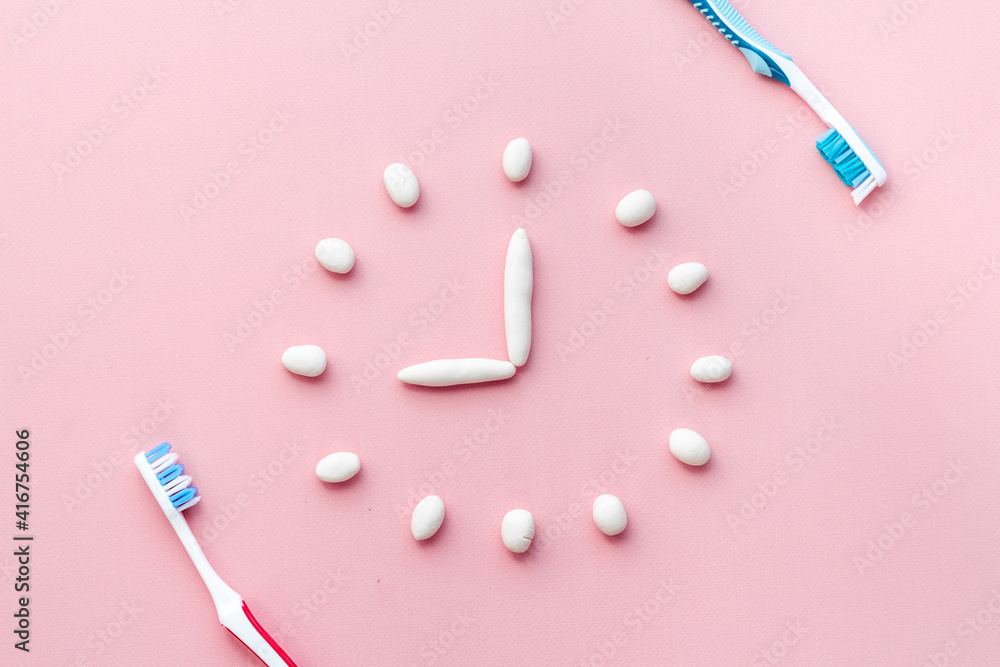 Teeth hygiene concept. Toothbrushes with toothpaste, top view Teeth hygiene concept. Toothbrushes with toothpaste, top view