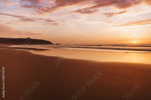sunset on a large outdoor beach