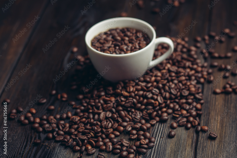 cup and saucer coffee beans on a wooden background aroma cup and saucer coffee beans on a wooden background aroma