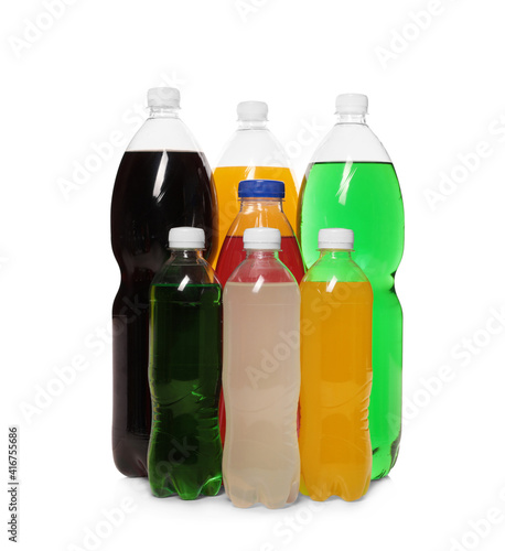 Bottles of soft drinks on white background