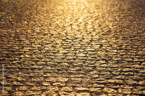 vintage street cobblestone in golden sunlight