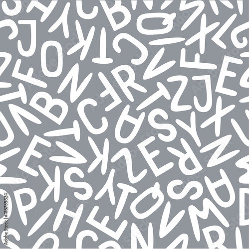 Vector seamless pattern with black English alphabet in handwriting on a white background. Modern haotic design.