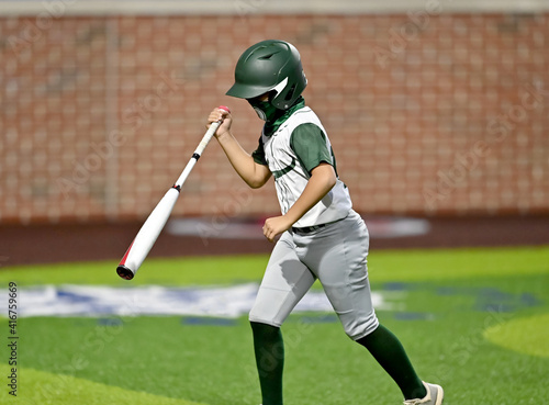 Wall Mural Action photo of high school baseball players making plays during a baseball game
