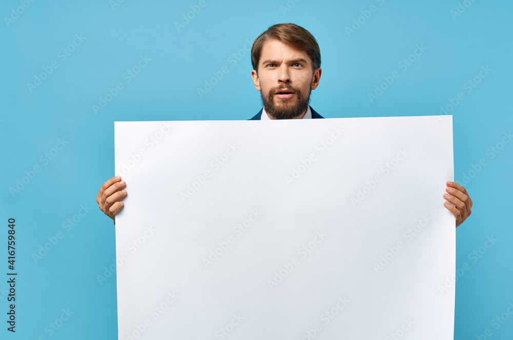 man holding banner advertisement blue background cropped view man holding banner advertisement blue background cropped view