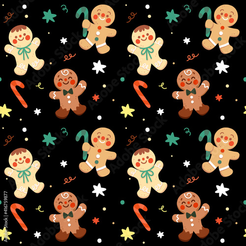 Seamless bright gingerbread cookies pattern. Gingerbread men cookies with stick candies and stars on the black background for Christmas.