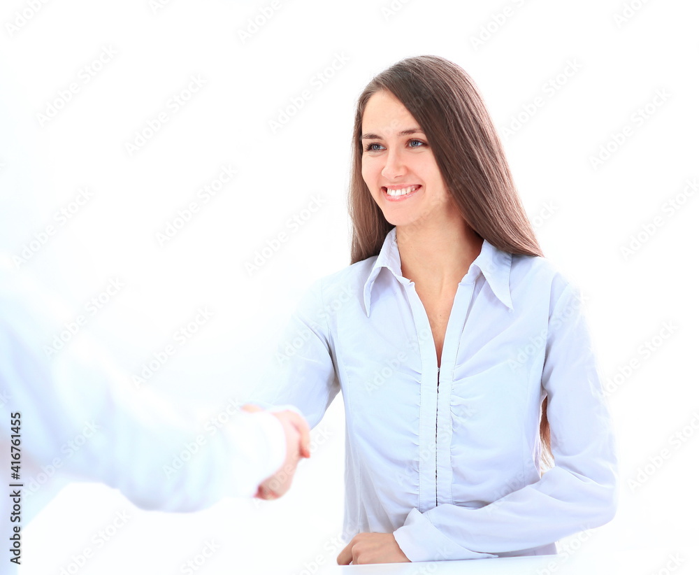 handshake of young business partners the concept of cooperation handshake of young business partners the concept of cooperation