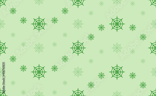 Seamless pattern of large and small green spider web symbols. The elements are arranged in a wavy. Vector illustration on light green background