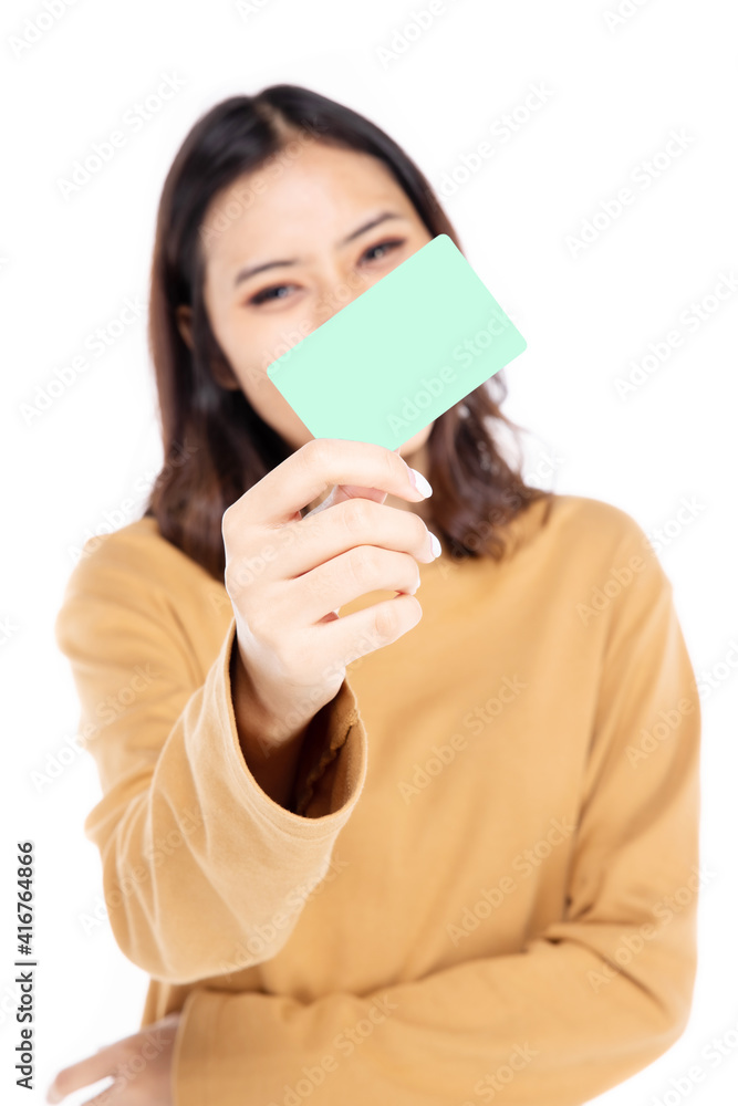 Portrait of a beautiful woman Asian teenagers Showing my credit card With a confident, happy face, a confident, beautiful woman on a white background. Portrait of a beautiful woman Asian teenagers Showing my credit card With a confident, happy face, a confident, beautiful woman on a white background.
