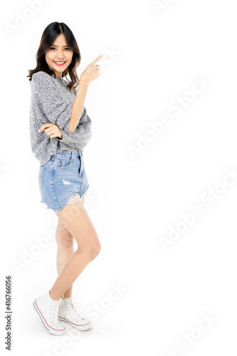 Beautiful young woman standing in full body in casual wear   Mixed race Asian Caucasian girl. Happy face  a confident  beautiful woman isolated on a white background.