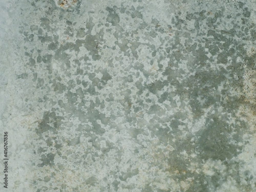 Fototapeta premium colored cement cracked concrete surface, texture of rough