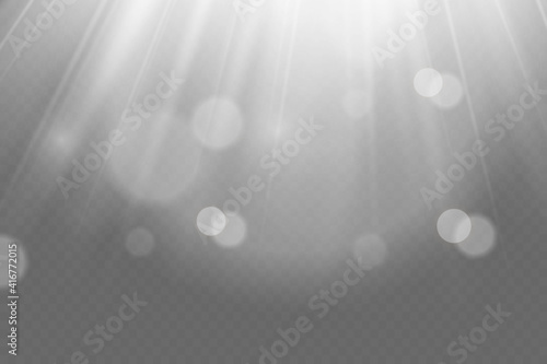 Yellow glowing light explodes on a transparent background. Sparkling magical dust particles. Bright Star. Transparent shining sun, bright flash. Vector sparkles. To center a bright flash.