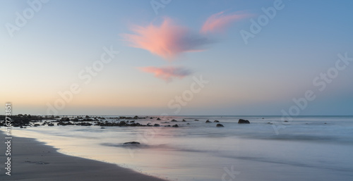 Pink Clouds over Ocean. New Plymouth Coastal Walkway  Taranaki  New Zealand.