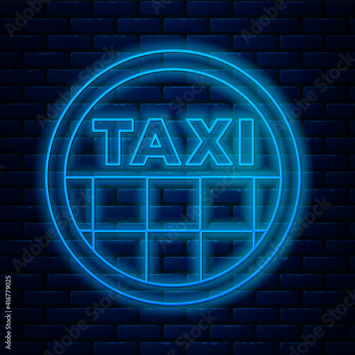 Glowing neon line Taxi car roof icon isolated on brick wall background. Vector.