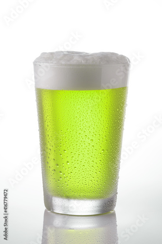 Photography Cold Saint Patrick Beer on a glass on a white background