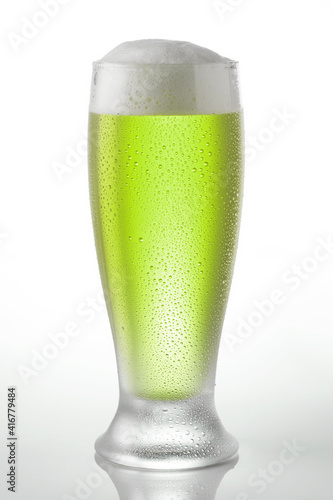 Canvas Print Cold Saint Patrick Beer on a glass on a white background