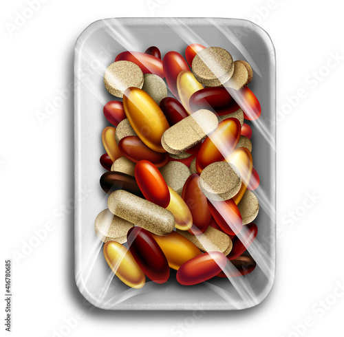 Health supplements and vitamin food supplement as a wrapped polystyrene tray with a group of capsule and pills as a natural nutrient medicine and dietary treatment. photo